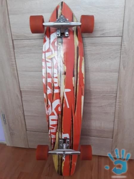 longboard-street-surfing-kicktail