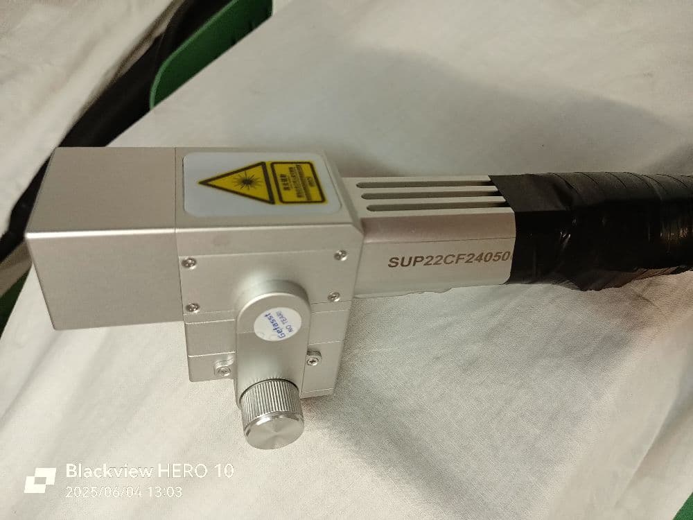 1749041442250-laser77