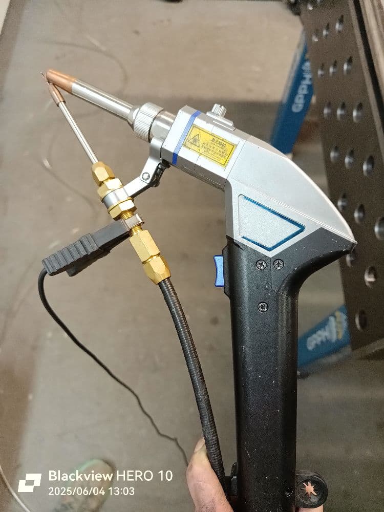 1749041697906-laser66